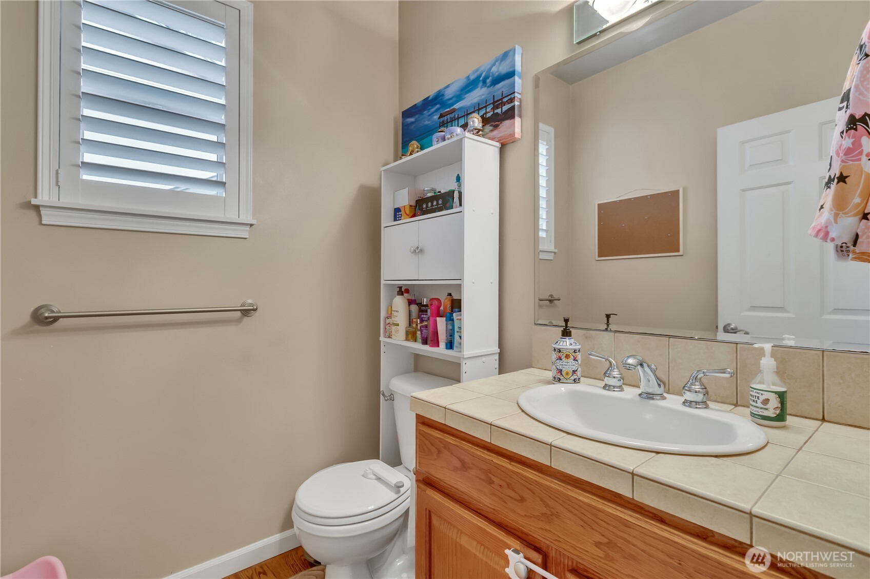 26525 Lake Fenwick Road South Kent, WA 98032 - Photo 15 of 40 a bathroom with a sink and a toilet