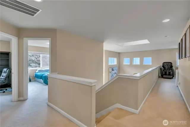 a view of living room with furniture and a window