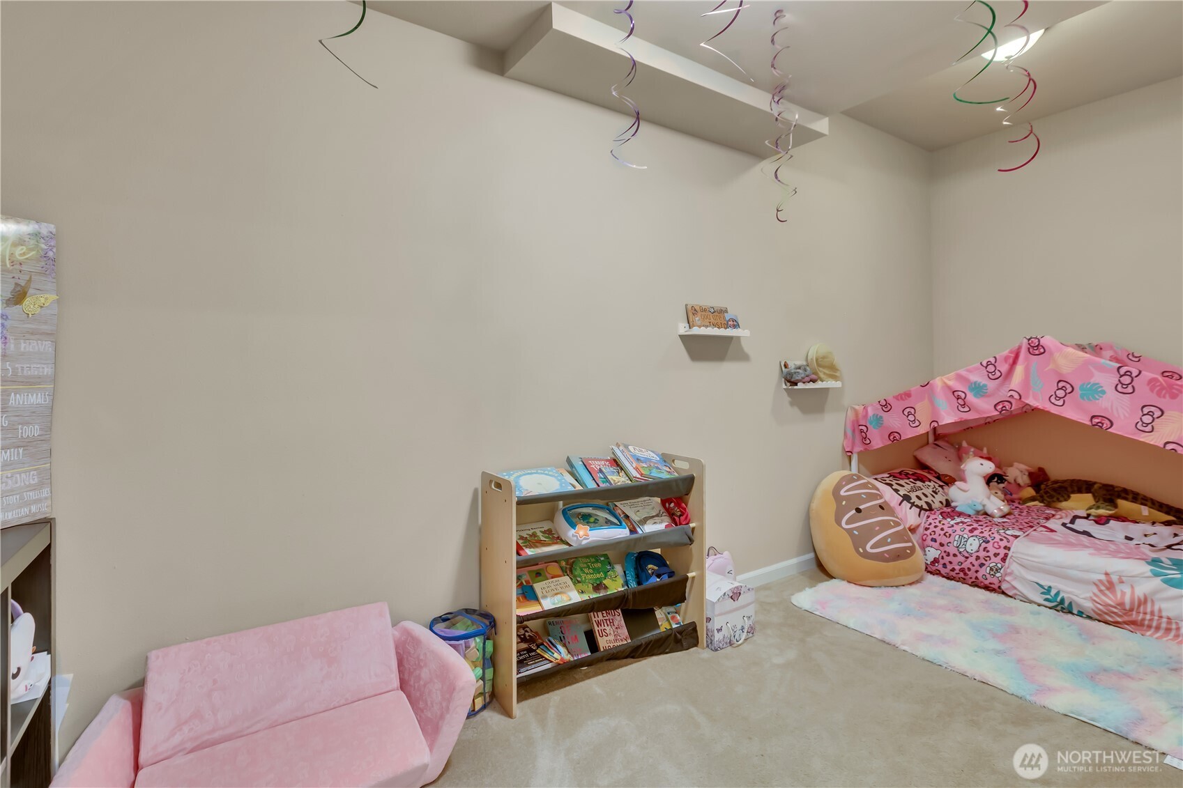 26525 Lake Fenwick Road South Kent, WA 98032 - Photo 28 of 40 a bedroom with a bed and a couch