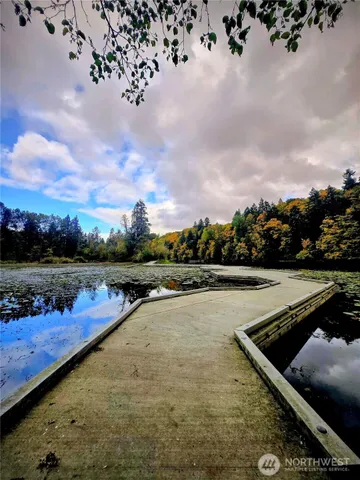 a view of a lake with outdoor space