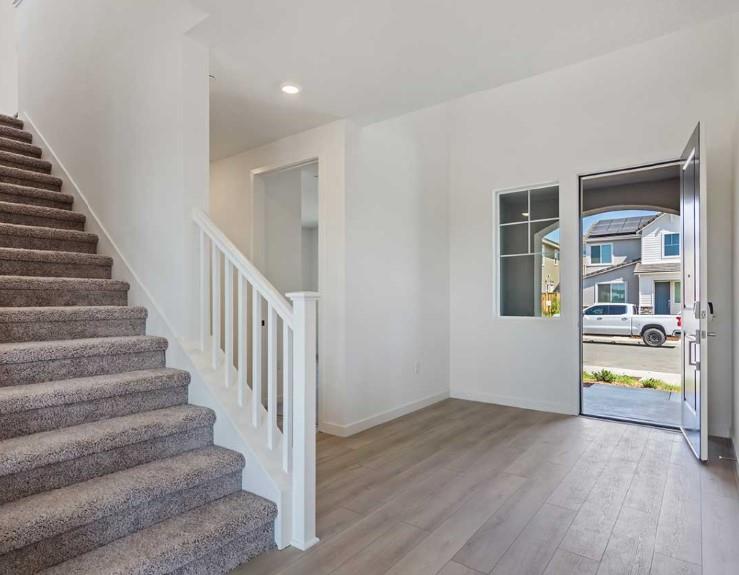 8649 Rockaway Drive Vallejo, CA 94591 - Photo 4 of 21 a view of an entryway with wooden floor and a living room