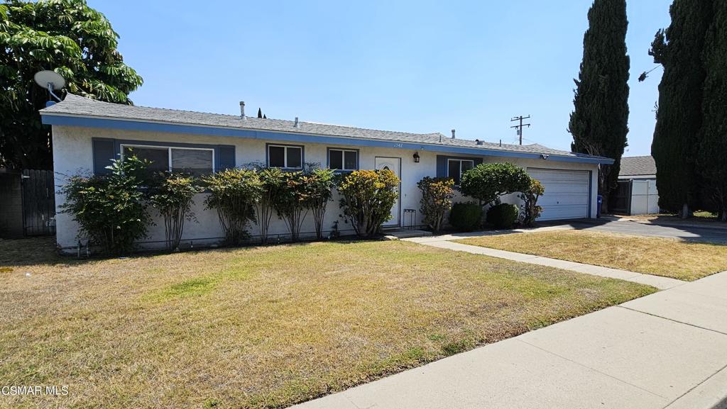 a front view of house with yard