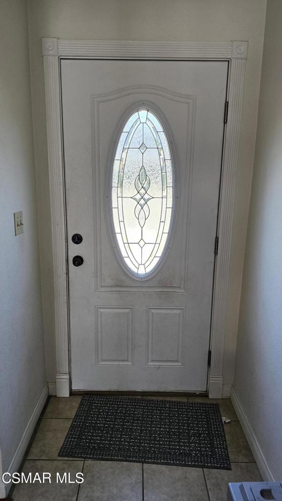 1542 Cochran Street Simi Valley, CA 93065 - Photo 4 of 5 a view of a hallway with wooden floor
