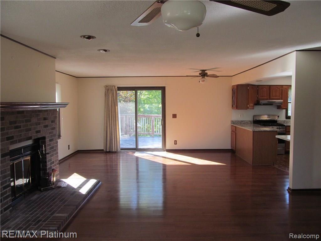 11666 Merrill Road Whitmore Lake, MI 48189 - Photo 14 of 26 Great Room with updated hardwood floors