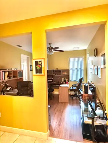 a view of a living room and dining room