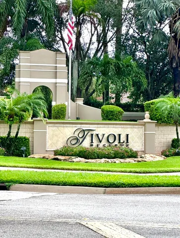 a view of sign board and yard