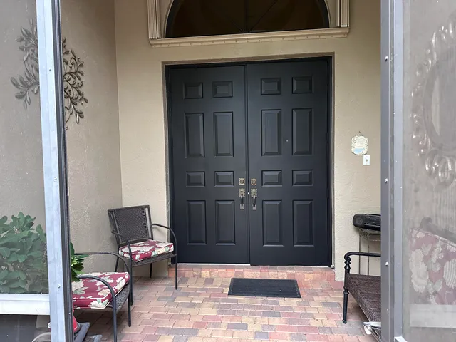 a view of a door and outdoor space