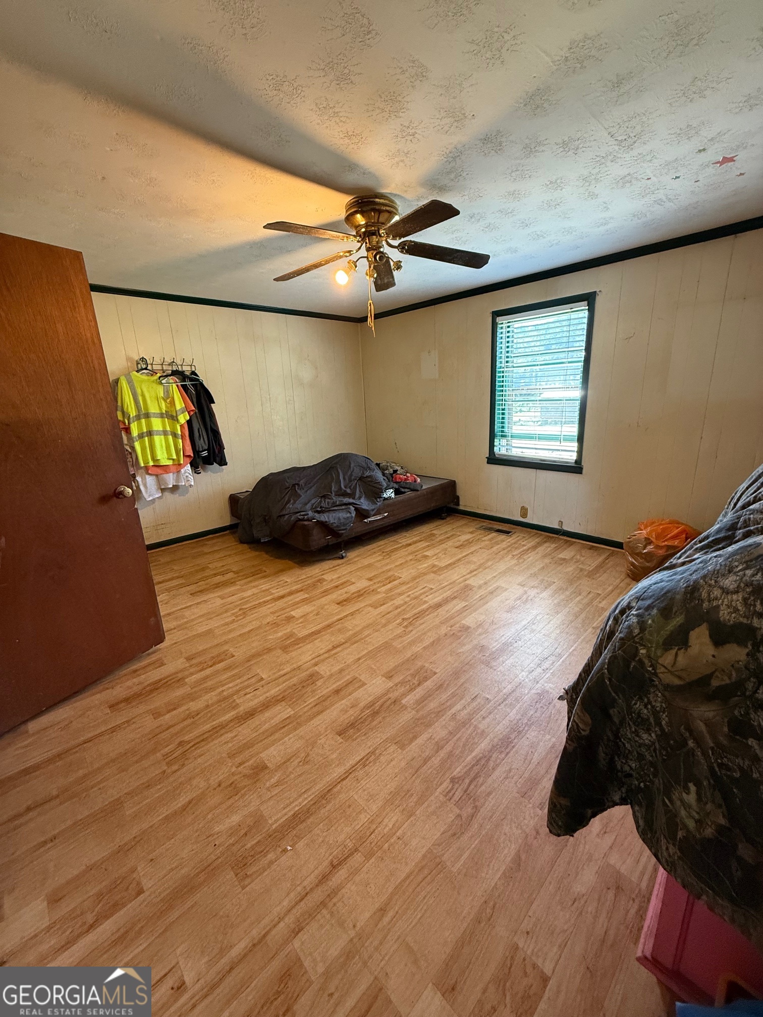 1600 Grant Avenue Manchester, GA 31816 - Photo 12 of 37 a bedroom with a bed and a window