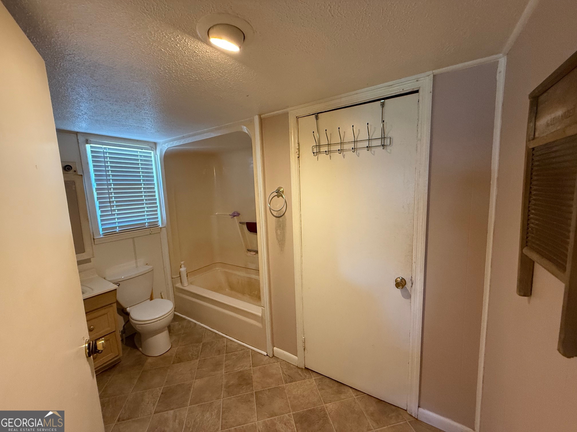 1600 Grant Avenue Manchester, GA 31816 - Photo 18 of 37 a bathroom with a shower and a toilet