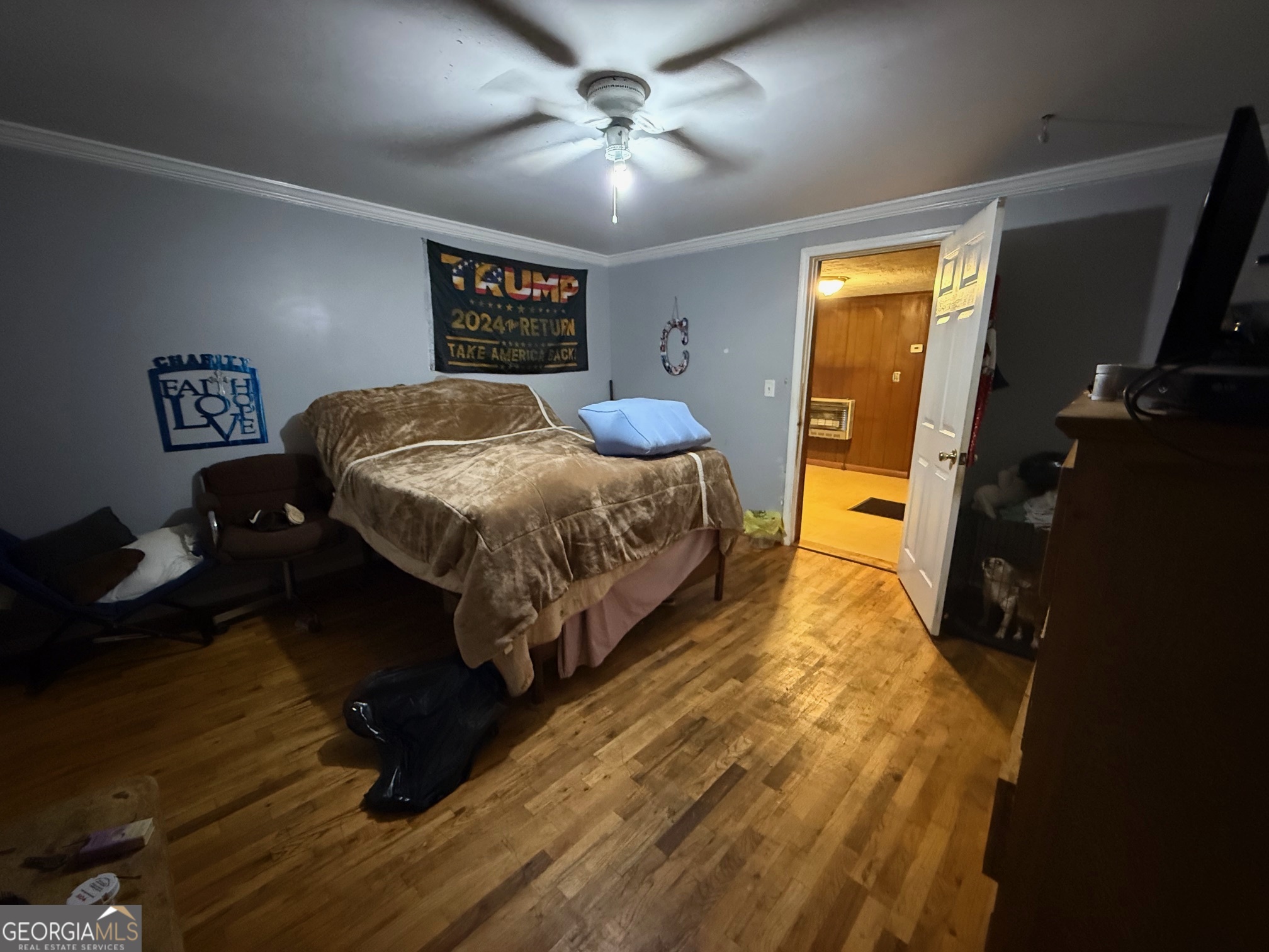 1600 Grant Avenue Manchester, GA 31816 - Photo 20 of 37 a bed sitting in a bedroom next to a window
