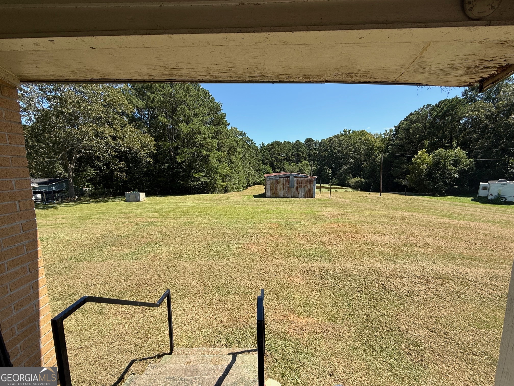 1600 Grant Avenue Manchester, GA 31816 - Photo 22 of 37 a view of an outdoor space and swimming pool