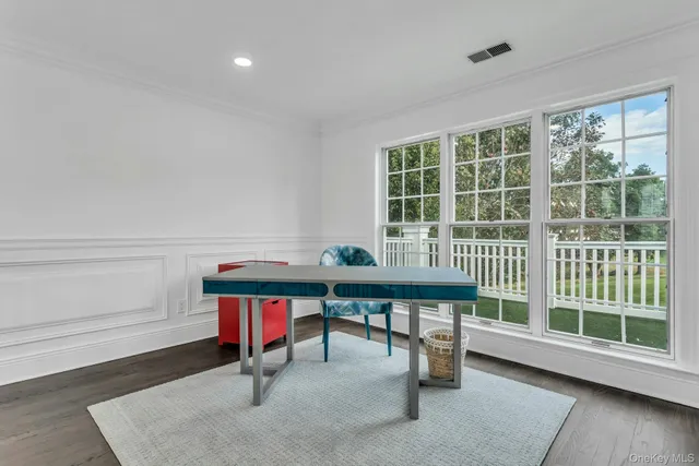 a room with furniture and a window