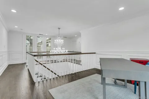 a view of entryway and kitchen