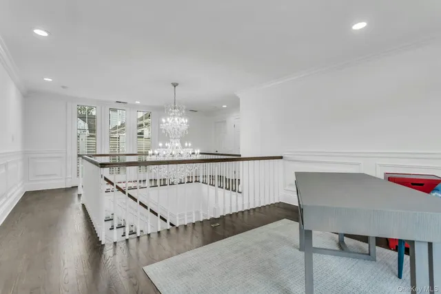 a view of entryway and kitchen