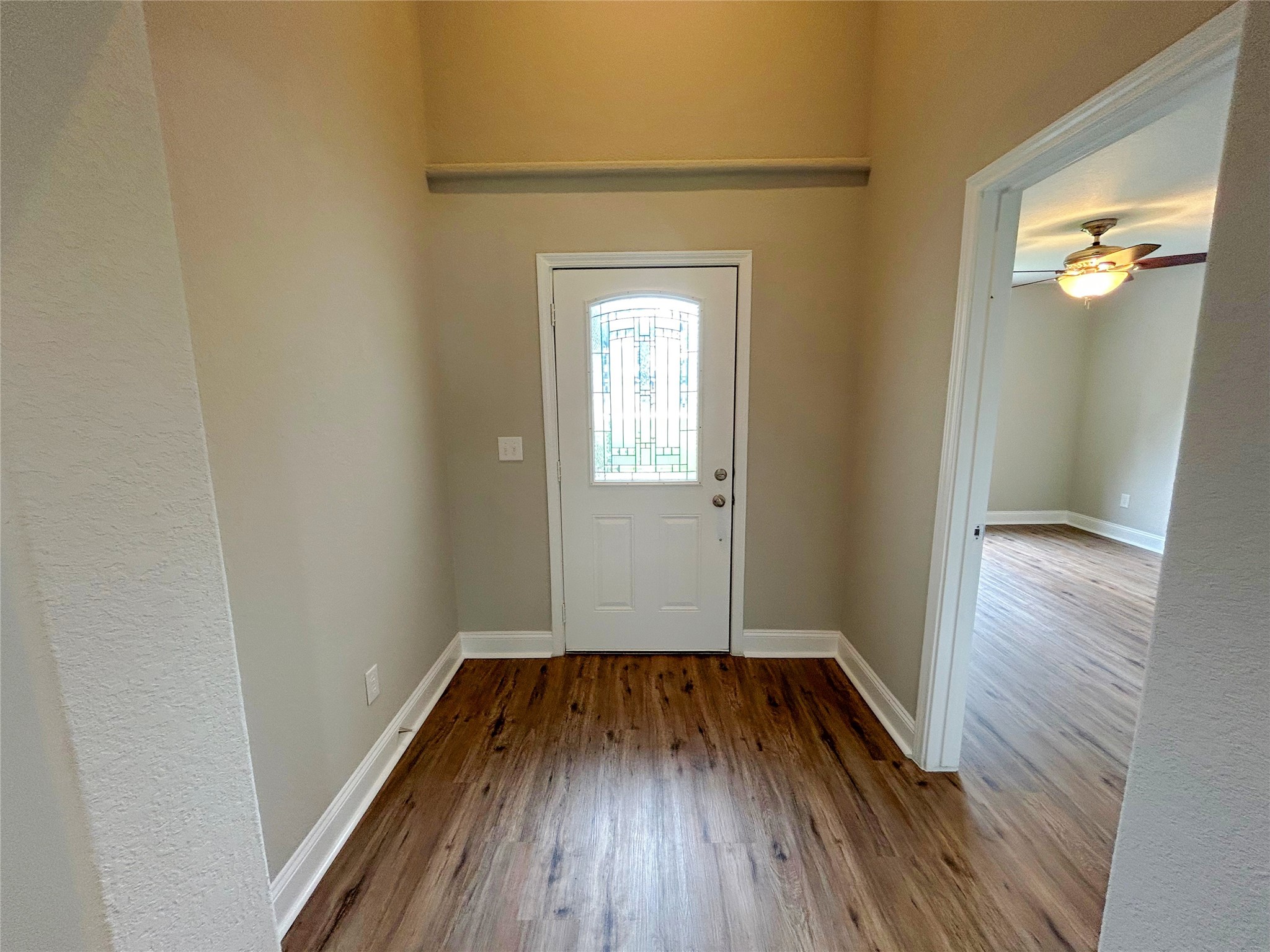 7902 Masters Manvel, TX 77578 - Photo 6 of 21 Great front entry. The interior of the home has been UPDATED WITH NEW LVP FLOORING AND NEW INTERIOR PAINT.