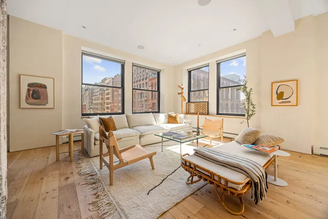 a kitchen with stainless steel appliances granite countertop a sink and a wooden cabinets