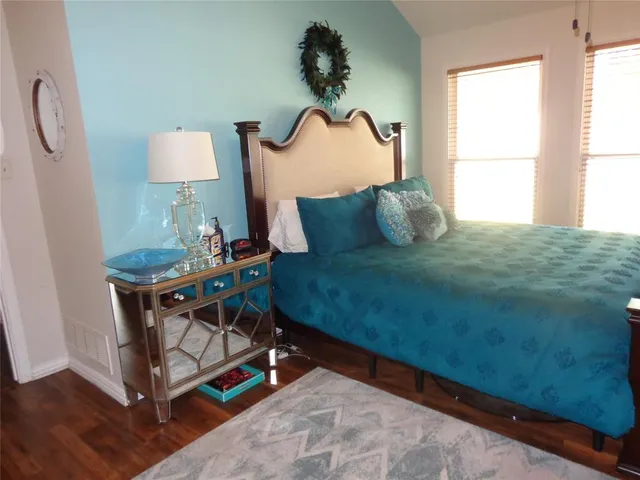 a kitchen with a table and chairs