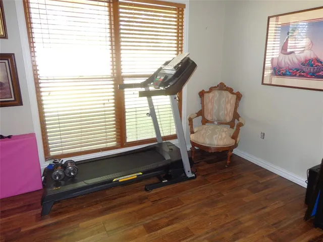 a bath tub sitting in a bathroom next to a window