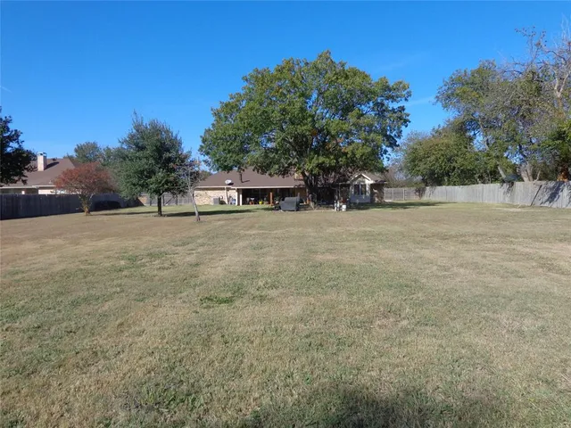 a view of outdoor space with deck having patio