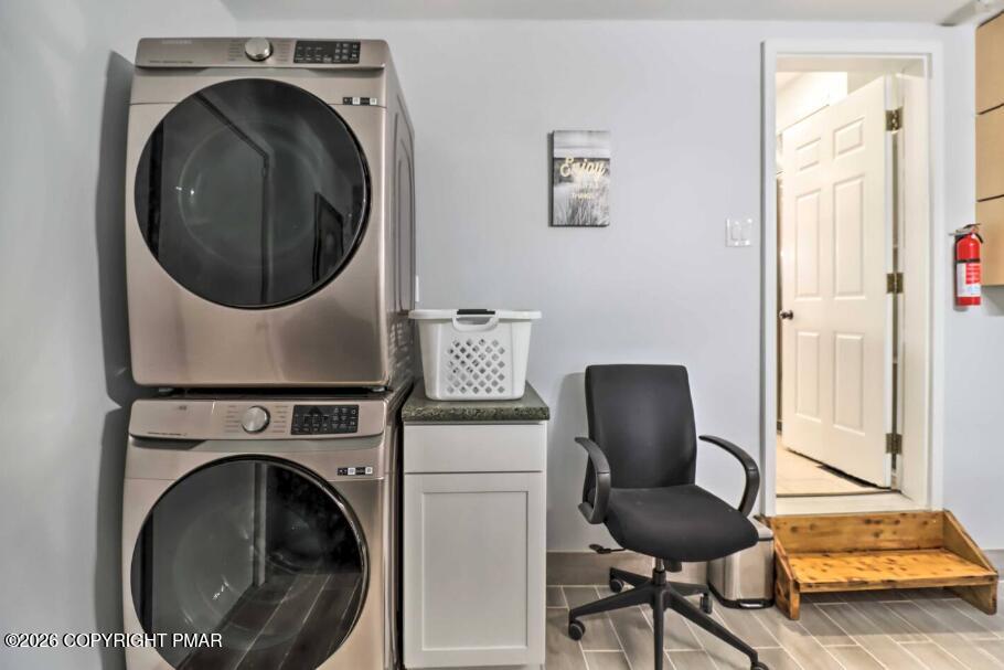 415 Alter Avenue, Unit 415 Pocono Summit, PA 18346 - Photo 16 of 21 a view of livingroom with washer and dryer