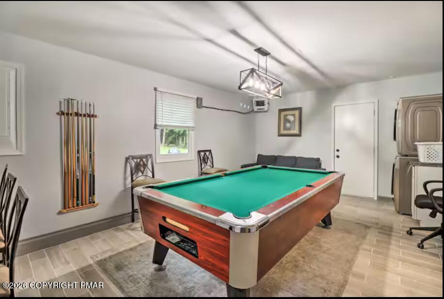 415 Alter Avenue, Unit 415 Pocono Summit, PA 18346 - Photo 17 of 21 a room with pool table and windows