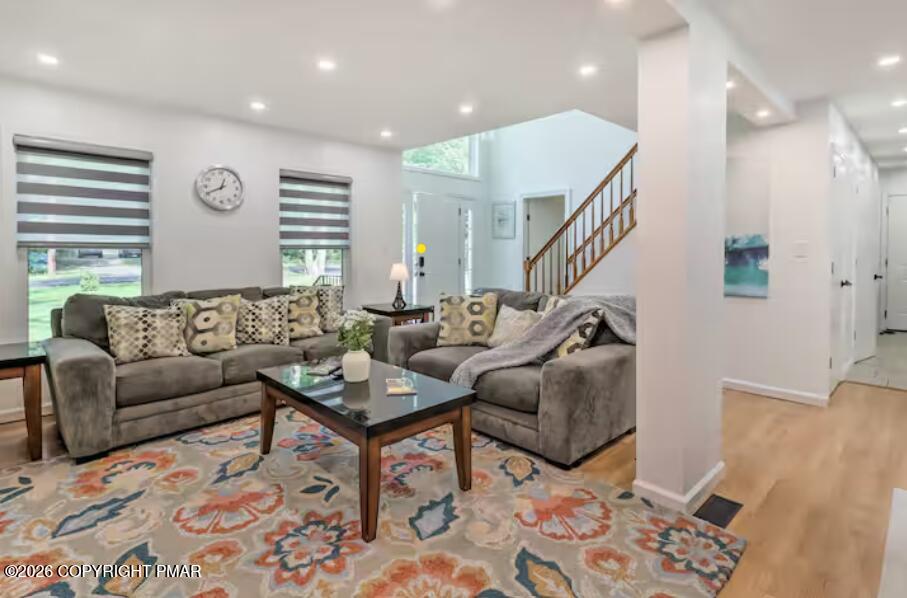 415 Alter Avenue, Unit 415 Pocono Summit, PA 18346 - Photo 3 of 21 a living room with furniture and wooden floor