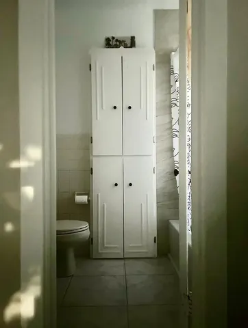 a view of a backyard with sitting area