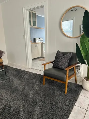 a view of a hallway with washer and dryer