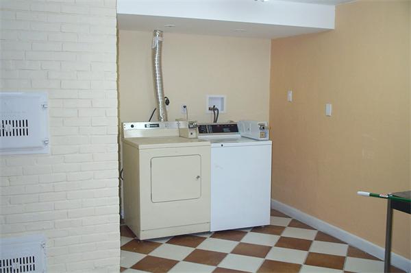 880 Broadway Chelsea, MA 02150 - Photo 16 of 18 a utility room with a sink dryer and washer