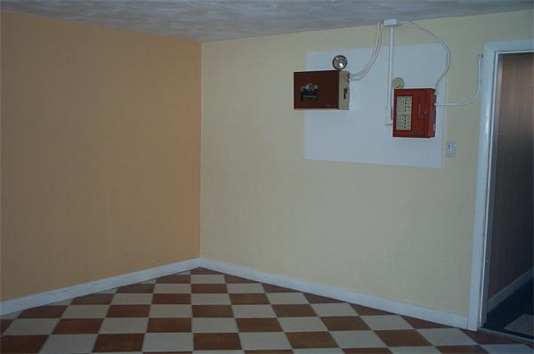 880 Broadway Chelsea, MA 02150 - Photo 18 of 18 a bathroom with a black and white checkered floor
