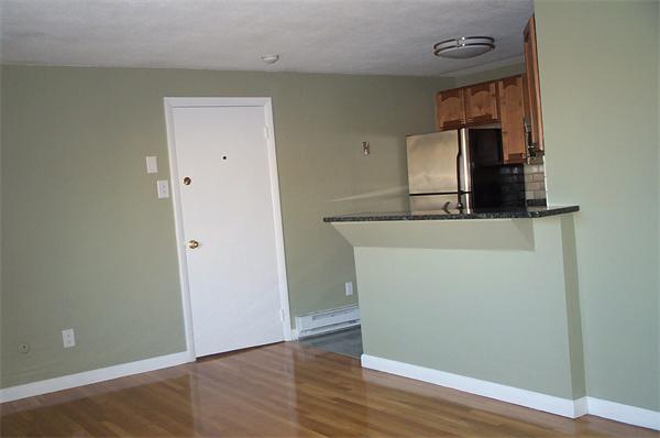 880 Broadway Chelsea, MA 02150 - Photo 8 of 18 wooden floor in an empty room