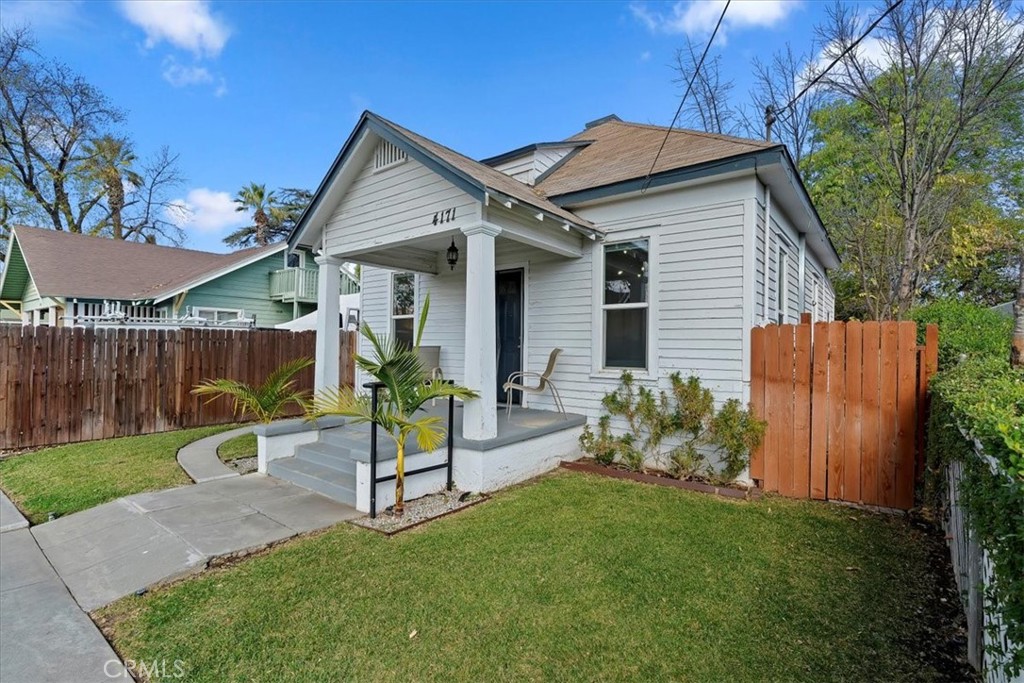 4171 9th Street Riverside, CA 92501 - Photo 3 of 19 a view of a house with backyard and a patio