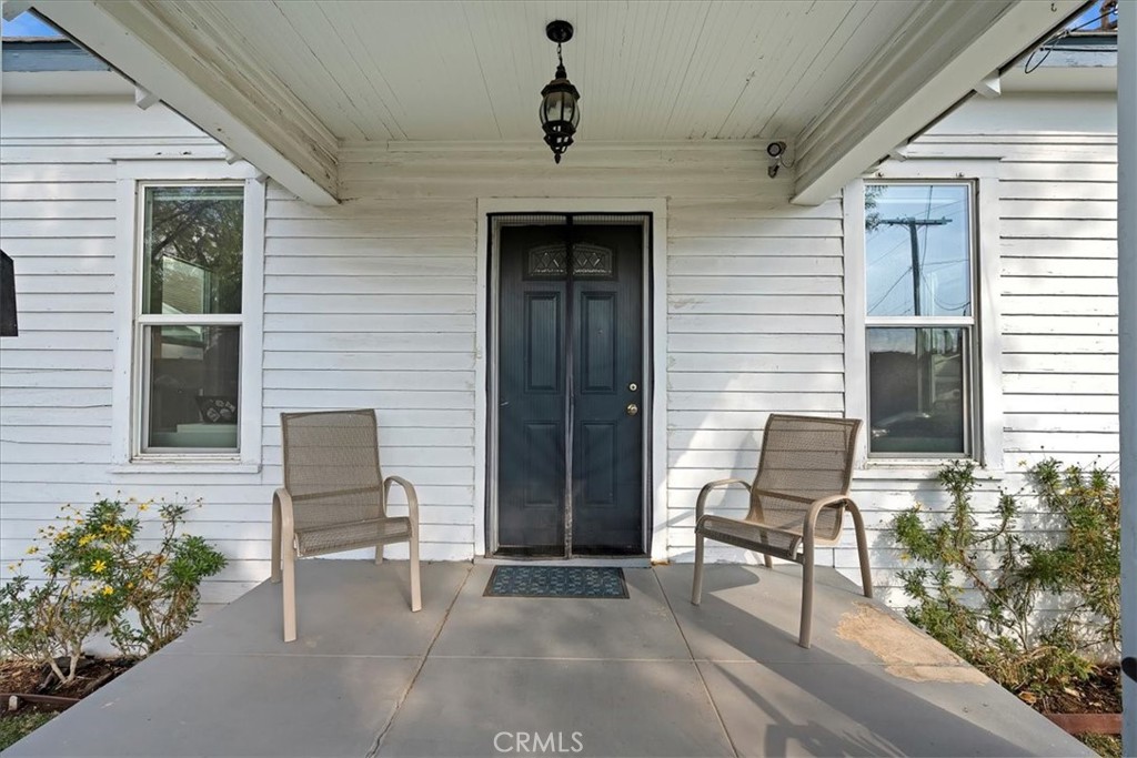 4171 9th Street Riverside, CA 92501 - Photo 4 of 19 a front view of a house with outdoor seating