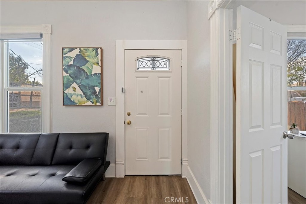 4171 9th Street Riverside, CA 92501 - Photo 5 of 19 a living room with furniture and a gate