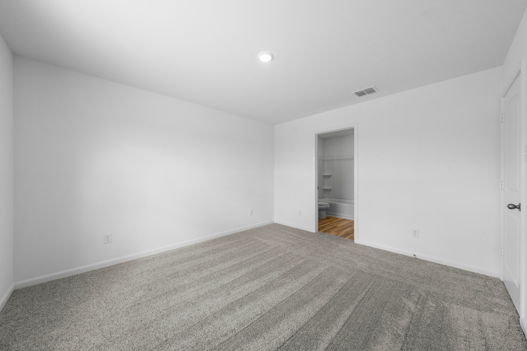 330 Low Pasture Trail Maxwell, TX 78656 - Photo 7 of 10 a view of an empty room with wooden floor