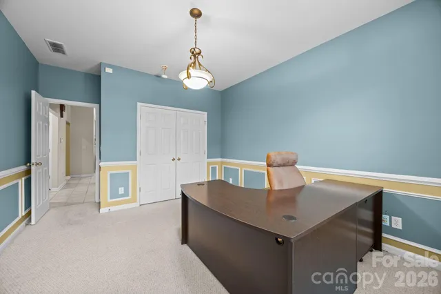 a view of a kitchen with a sink