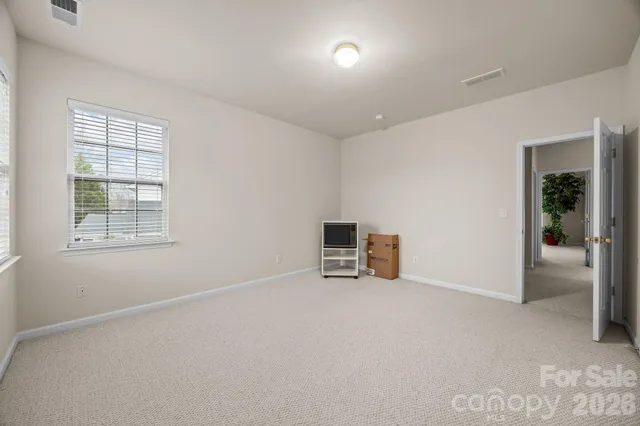 an empty room with windows