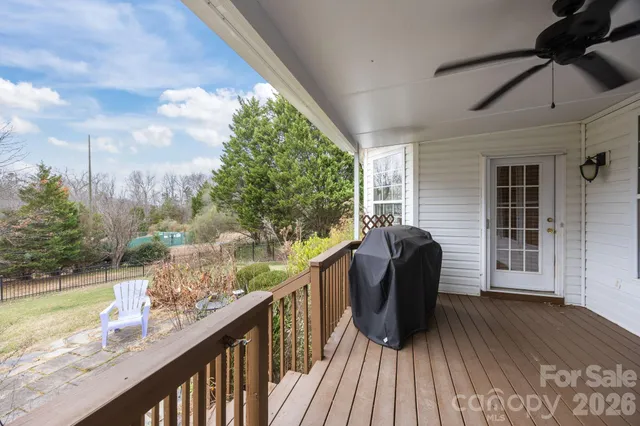 a view of a balcony with furniture