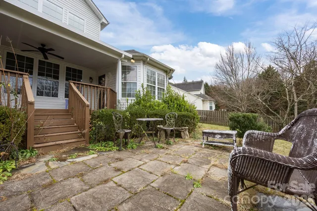 a view of balcony with furniture