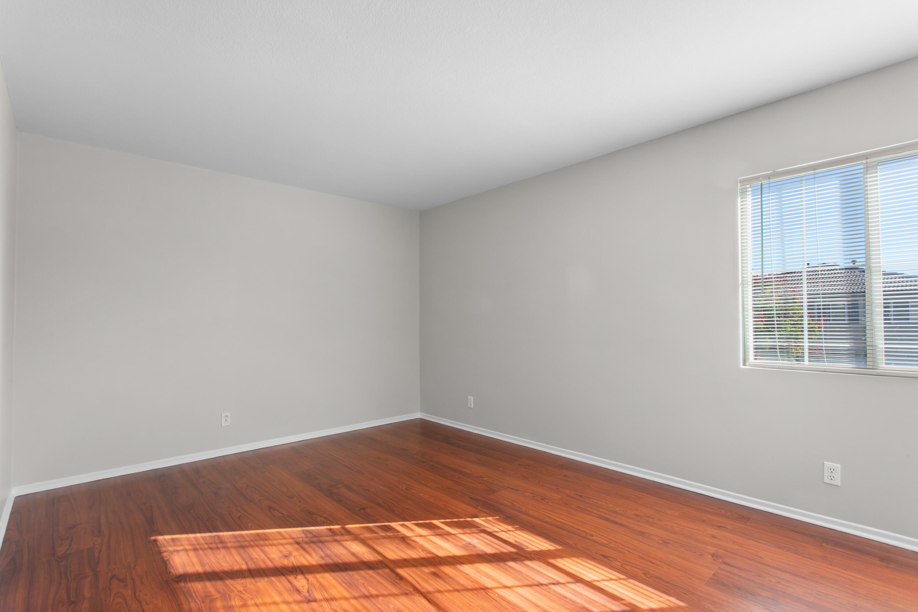 41970 Pacific Grove Way Temecula, CA 92591 - Photo 42 of 54 a view of empty room with wooden floor