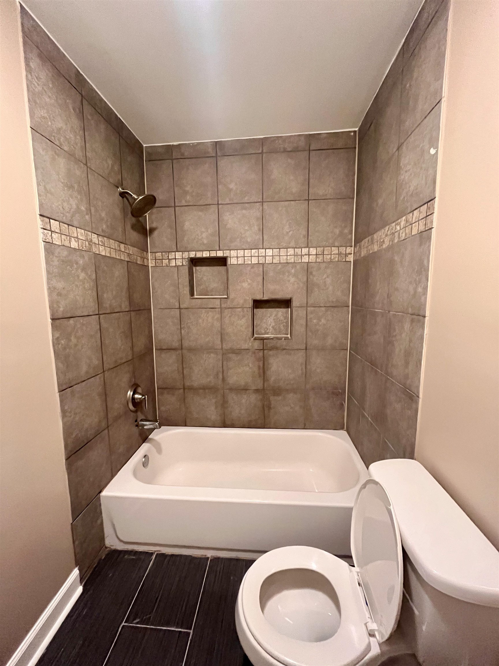 1204 Margaret Road Memphis, TN 38109 - Photo 14 of 25 a bathroom with a sink a toilet and shower