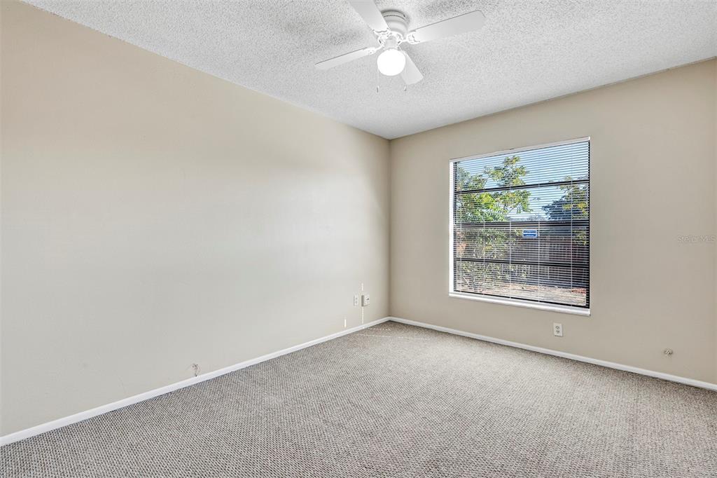6701 Merlin Court Orlando, FL 32810 - Photo 24 of 54 an empty room with a window