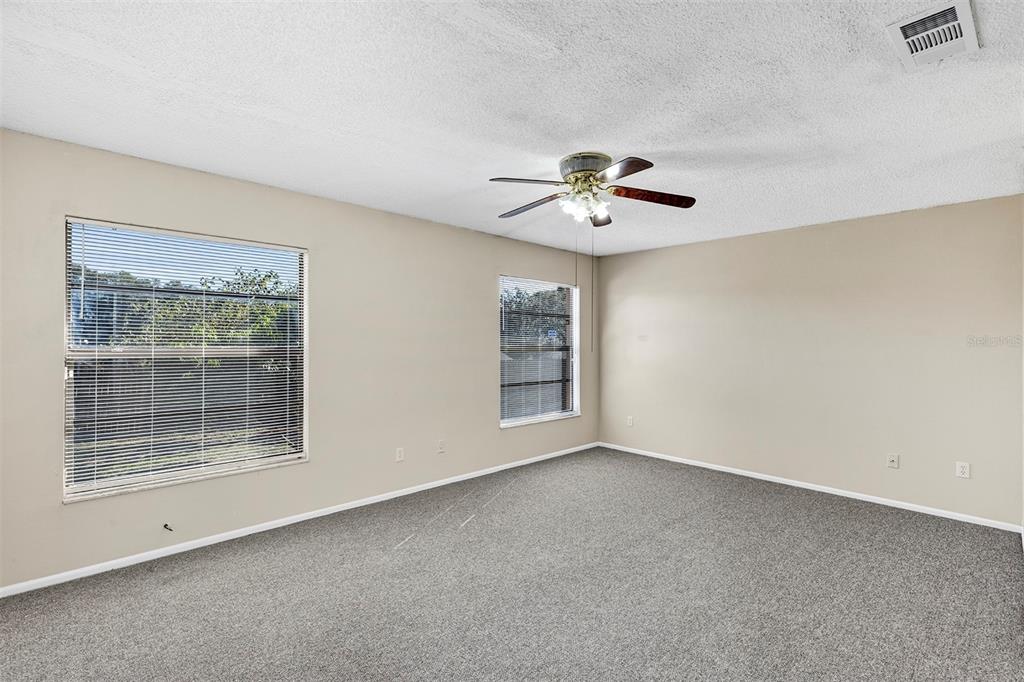 6701 Merlin Court Orlando, FL 32810 - Photo 36 of 54 a view of an empty room with a window