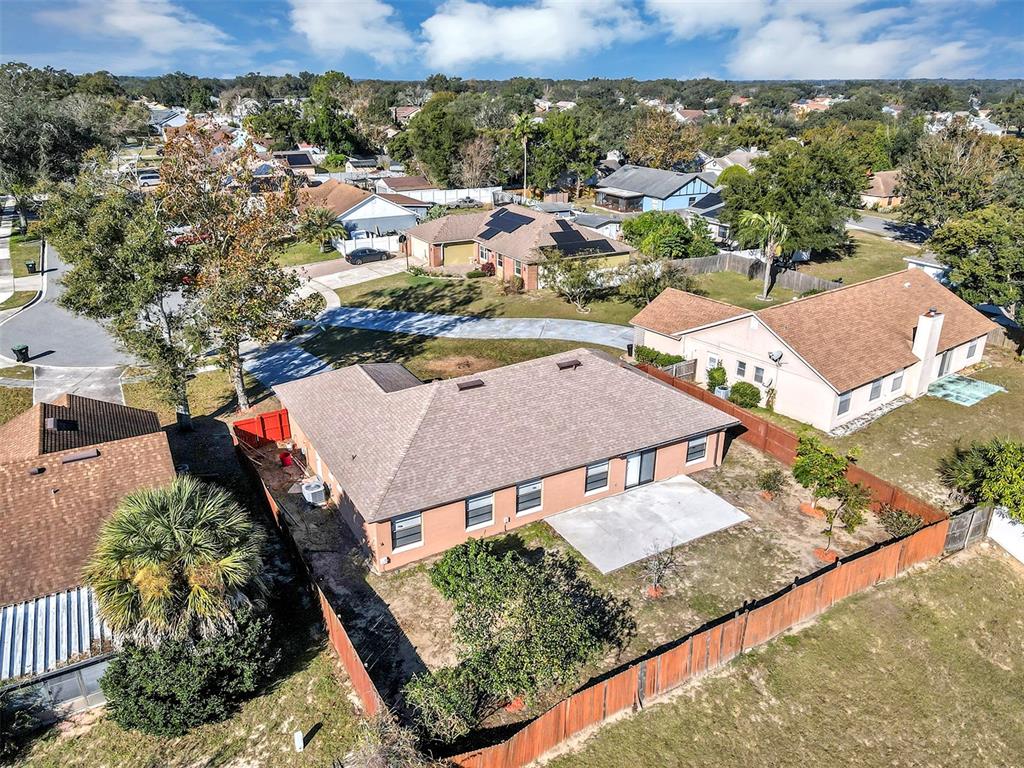 6701 Merlin Court Orlando, FL 32810 - Photo 44 of 54 an aerial view of a house