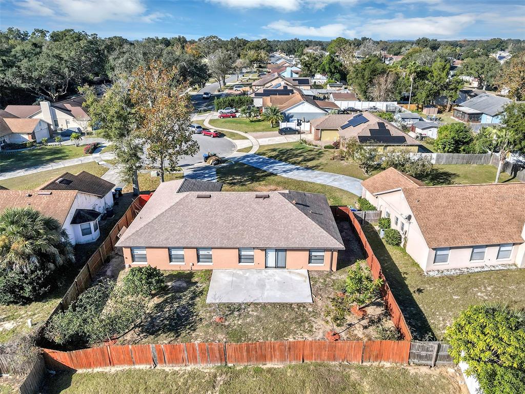6701 Merlin Court Orlando, FL 32810 - Photo 45 of 54 an aerial view of residential houses with outdoor space