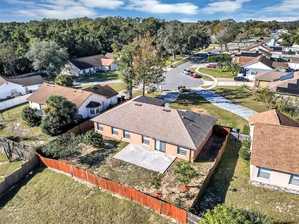 6701 Merlin Court Orlando, FL 32810 - Photo 47 of 54 an aerial view of a house