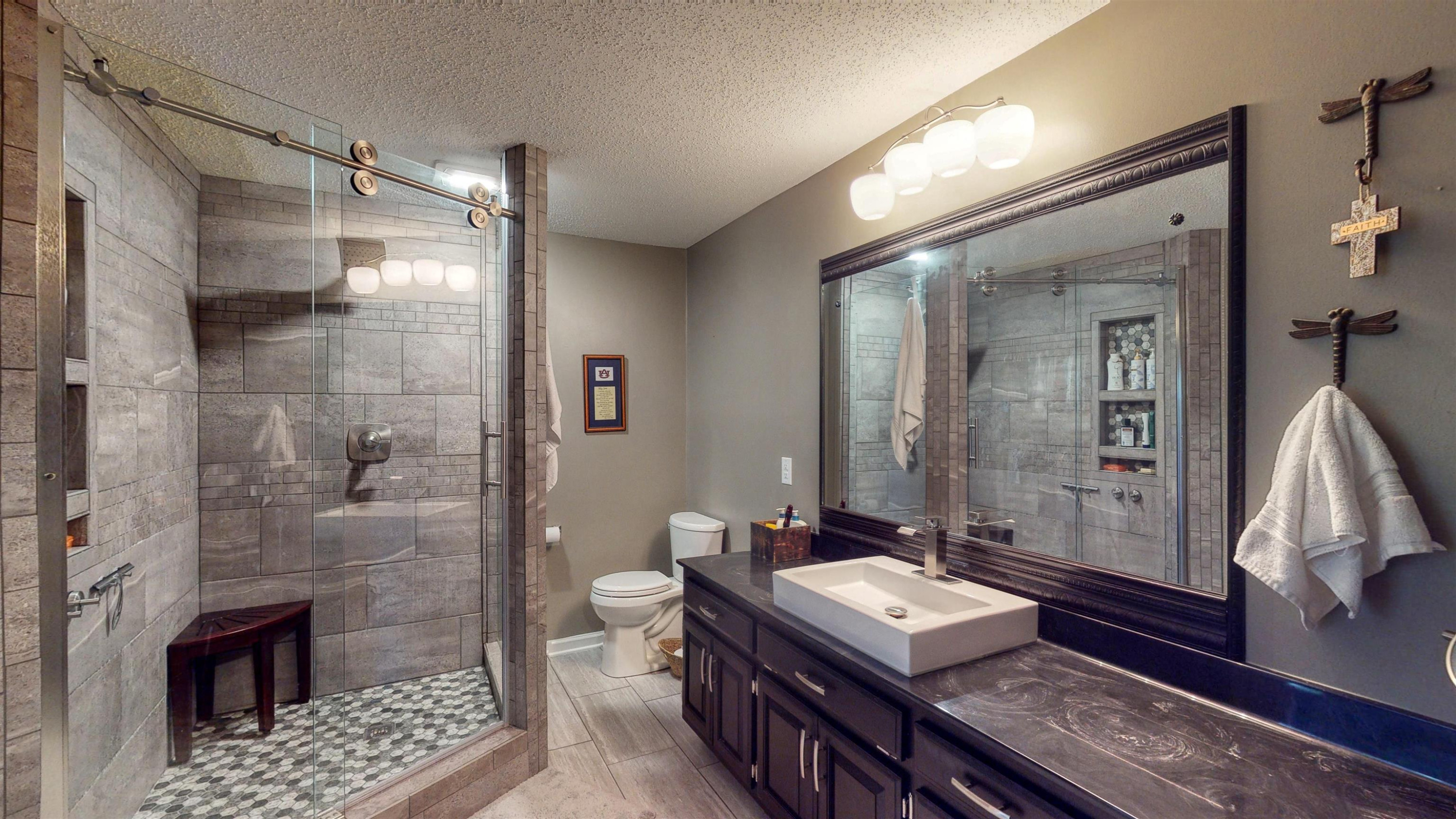 1632 Stafford Store Road Greenfield, TN 38230 - Photo 8 of 24 a bathroom with a sink a toilet and shower