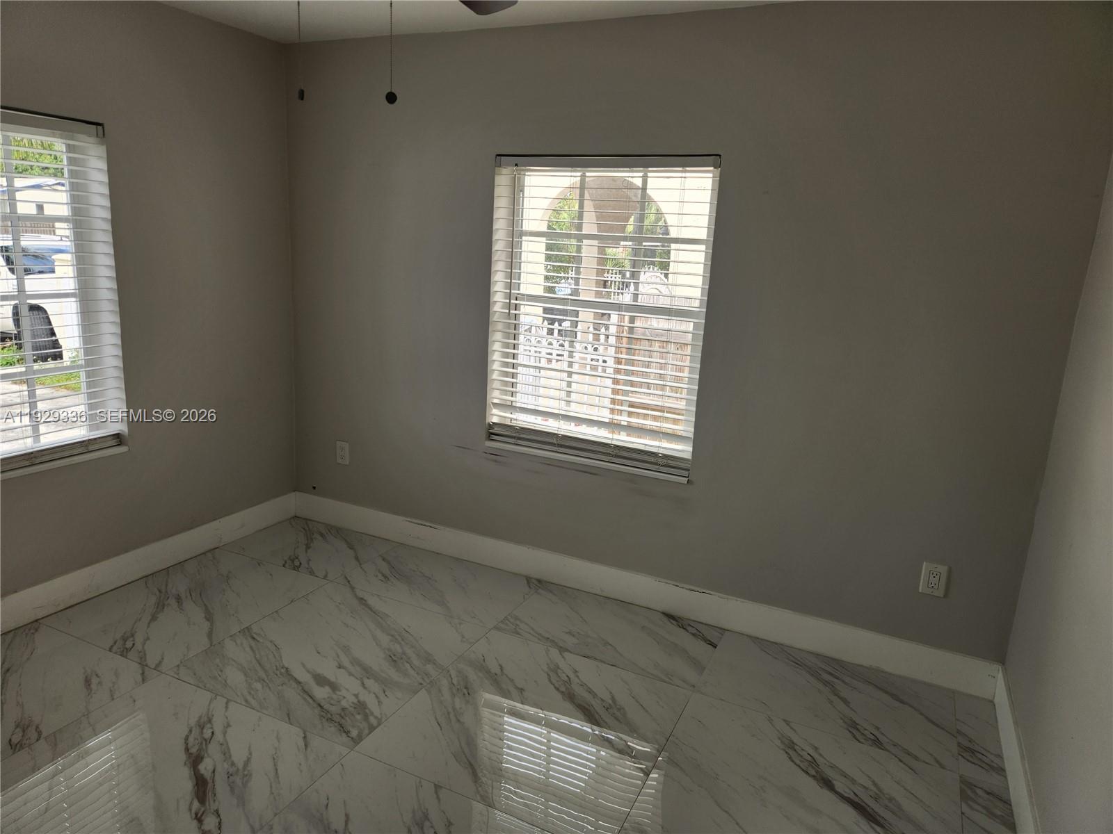 342 East 46th Street, Unit 1 Hialeah, FL 33013 - Photo 17 of 26 an empty room with a window