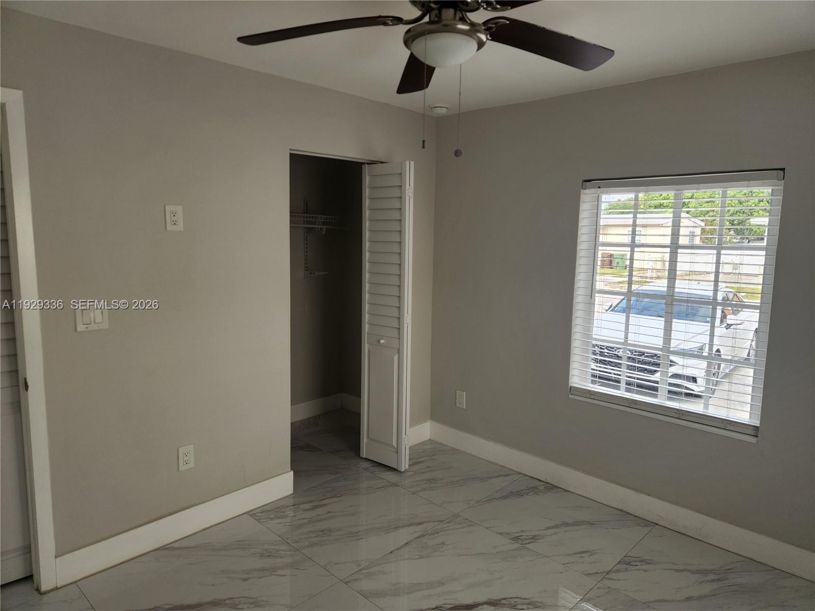 342 East 46th Street, Unit 1 Hialeah, FL 33013 - Photo 18 of 26 a view of an empty room with a window
