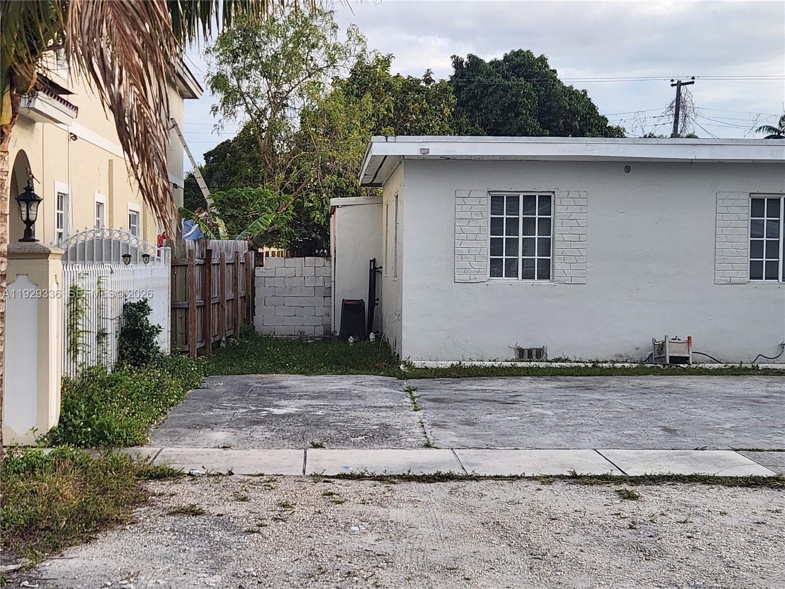 342 East 46th Street, Unit 1 Hialeah, FL 33013 - Photo 21 of 26 a house with a tree in the background